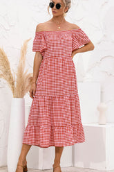 Robe mi-longue à carreaux et épaules dénudées